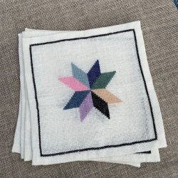 Peters stjerne - mellemlægsservietter med broderi