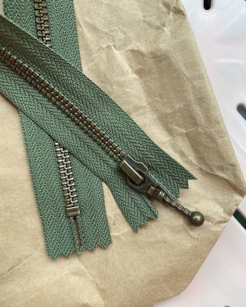 Lynlås til Zipper Sweater
