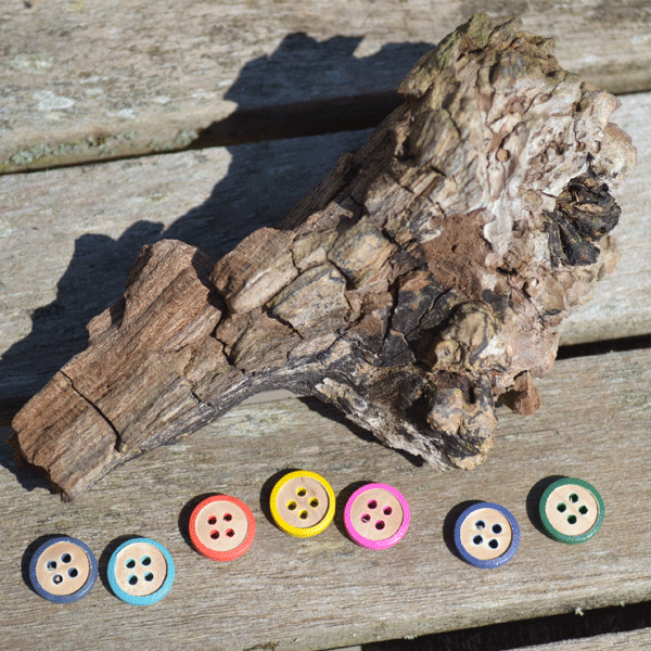 Trknap med farvet kant