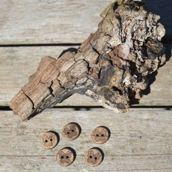 Knap med sommerfugl.