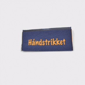 Hndstrikket - dobbletlabel
